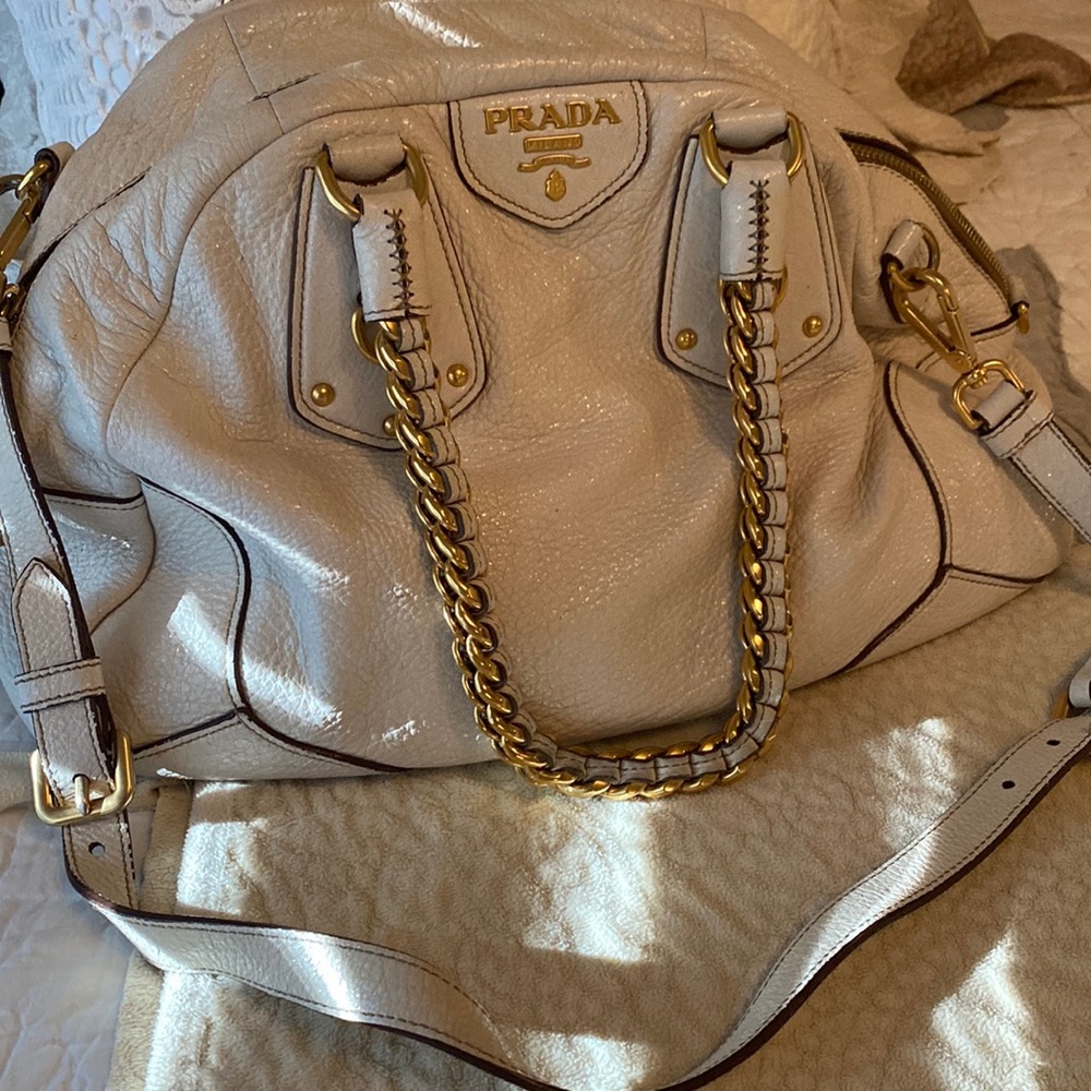 Beautiful Prada bag with strap and handles